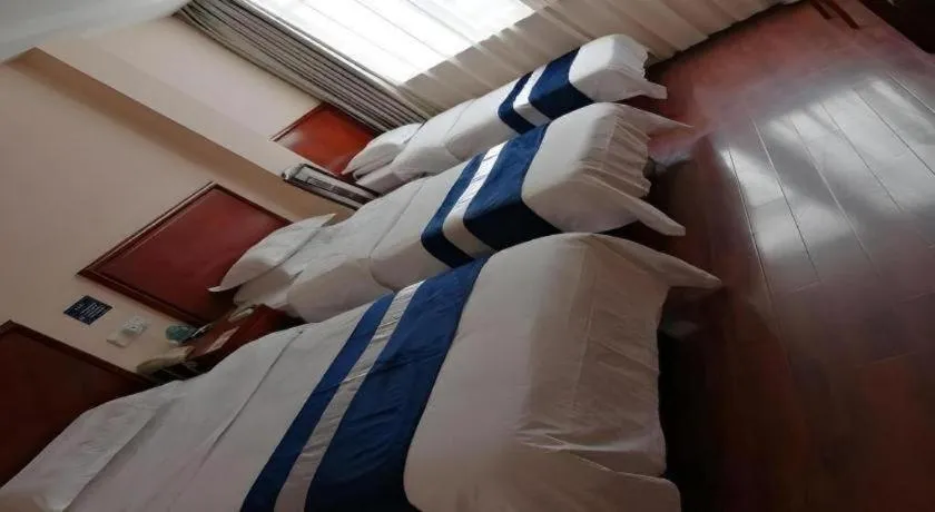 Bed in GreenTree Inn Nantong Haian Kaifa District Express Hotel