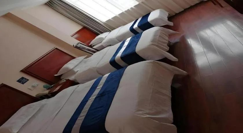 Bed in GreenTree Inn Nantong Haian Kaifa District Express Hotel