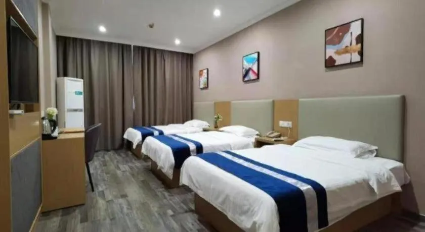 Bed in GreenTree Inn Nantong Haian Kaifa District Express Hotel