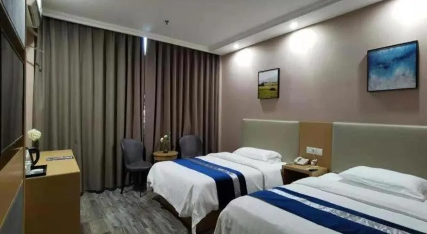 Bed in GreenTree Inn Nantong Haian Kaifa District Express Hotel