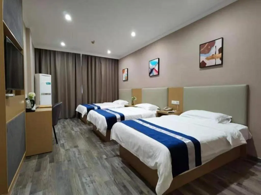 Bed in GreenTree Inn Nantong Haian Kaifa District Express Hotel
