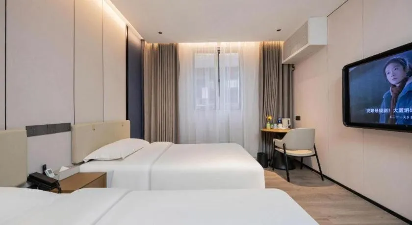 Bed in GreenTree Inn Guangzhou Panyu Bus Station Business Hotel