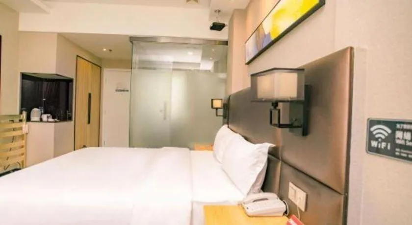 Bed in GreenTree Inn Guangzhou Panyu Bus Station Business Hotel