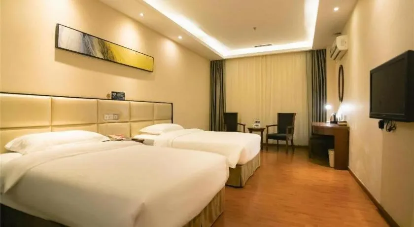 Bed in GreenTree Inn Guangzhou Panyu Bus Station Business Hotel