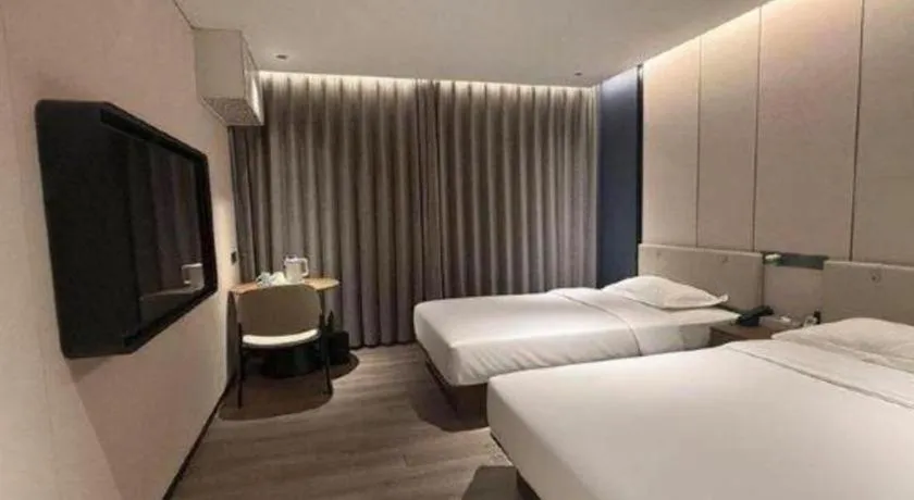 Bed in GreenTree Inn Guangzhou Panyu Bus Station Business Hotel