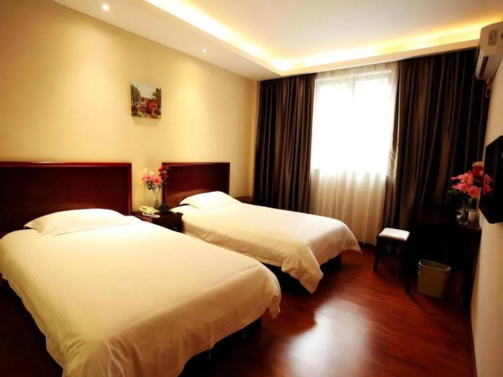 Bed in GreenTree Inn Guangzhou Panyu Bus Station Business Hotel