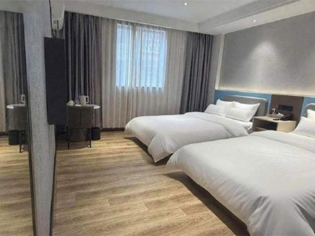 Bed in GreenTree Inn Guangzhou Panyu Bus Station Business Hotel