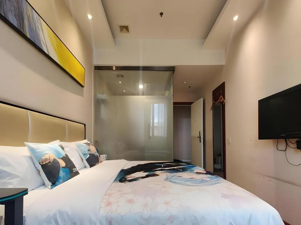 Bed in GreenTree Inn Guangzhou Panyu Bus Station Business Hotel