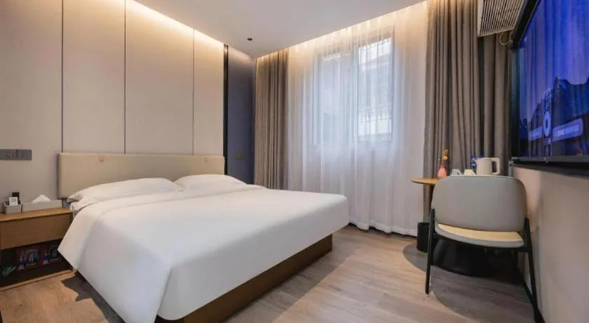 Bed in GreenTree Inn Guangzhou Panyu Bus Station Business Hotel