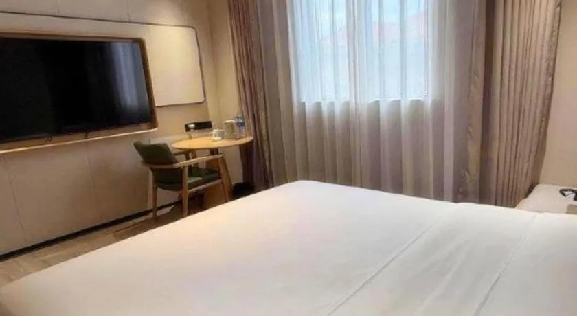 Bed in GreenTree Inn Guangzhou Panyu Bus Station Business Hotel