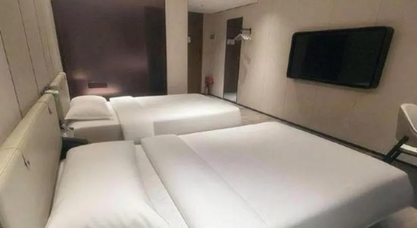 Bed in GreenTree Inn Guangzhou Panyu Bus Station Business Hotel
