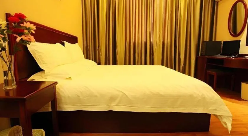 Bed in GreenTree Inn Guangzhou Panyu Bus Station Business Hotel