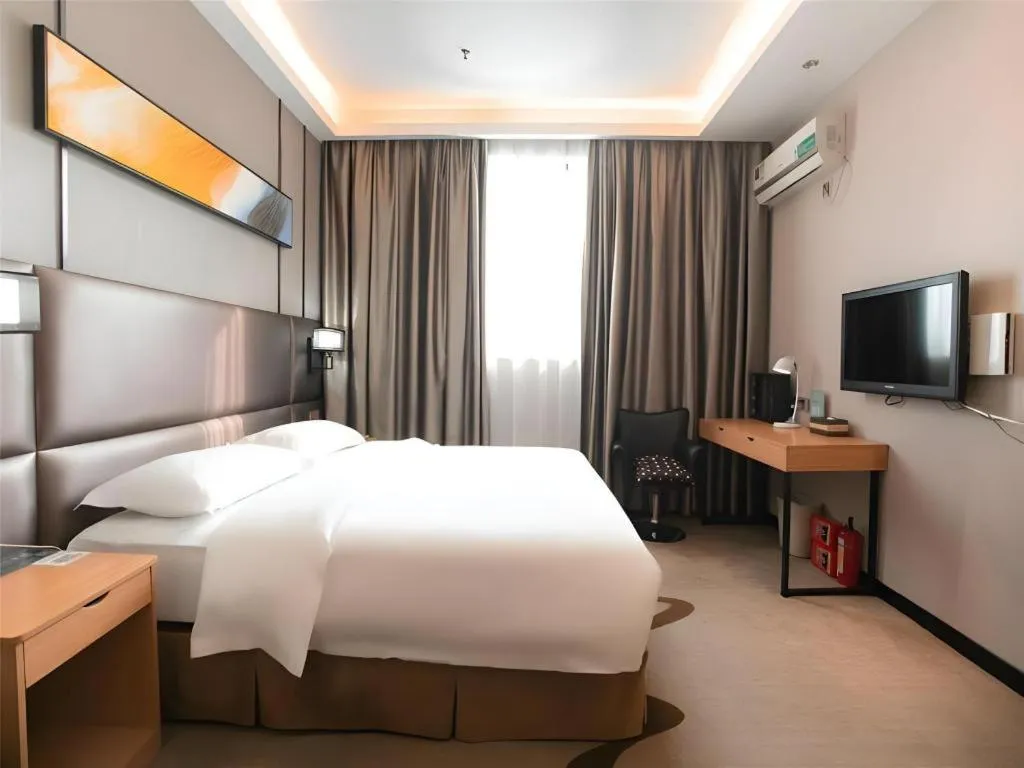 Bed in GreenTree Inn Guangzhou Panyu Bus Station Business Hotel