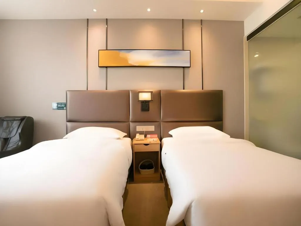 Bed in GreenTree Inn Guangzhou Panyu Bus Station Business Hotel