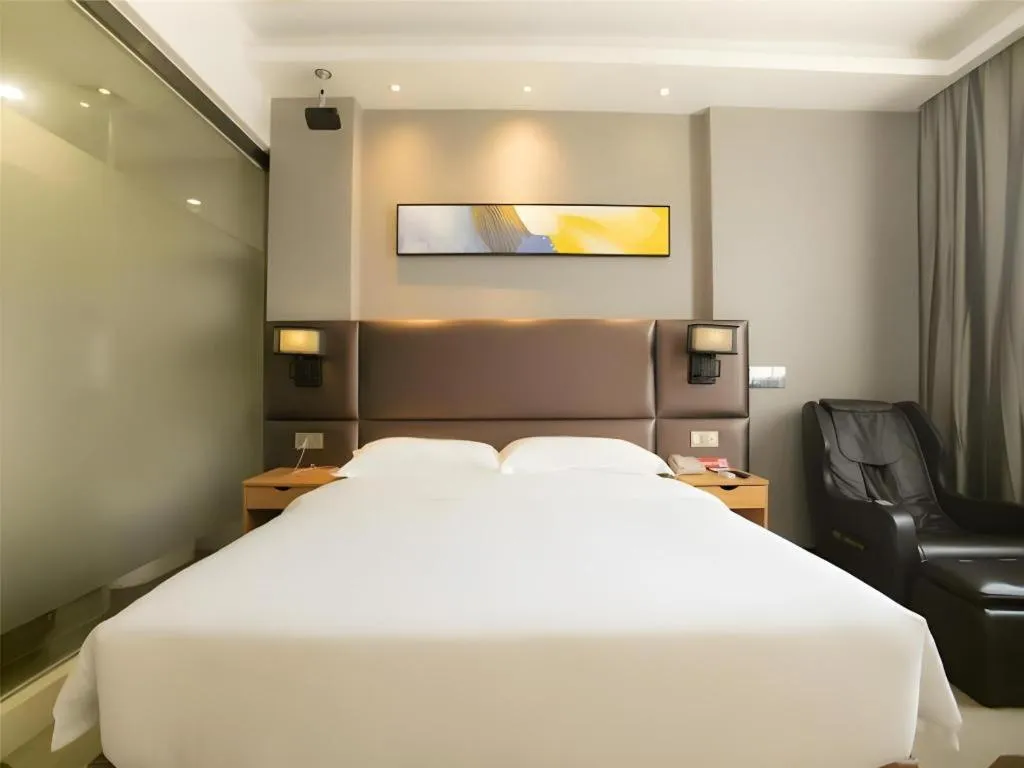 Bed in GreenTree Inn Guangzhou Panyu Bus Station Business Hotel
