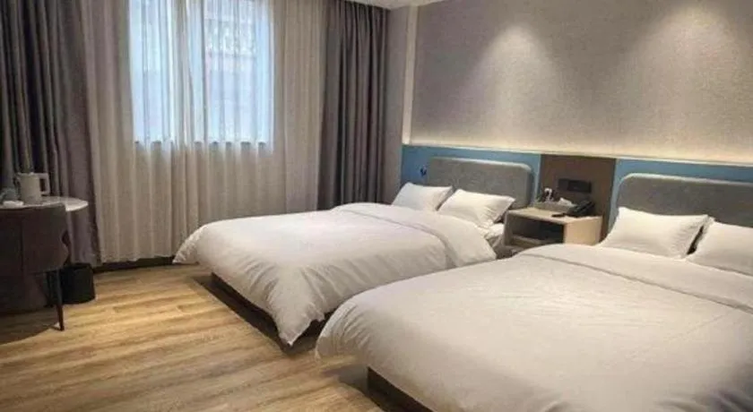 Bed in GreenTree Inn Guangzhou Panyu Bus Station Business Hotel