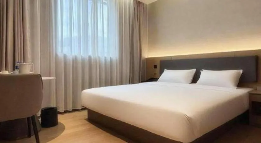 Bed in GreenTree Inn Guangzhou Panyu Bus Station Business Hotel