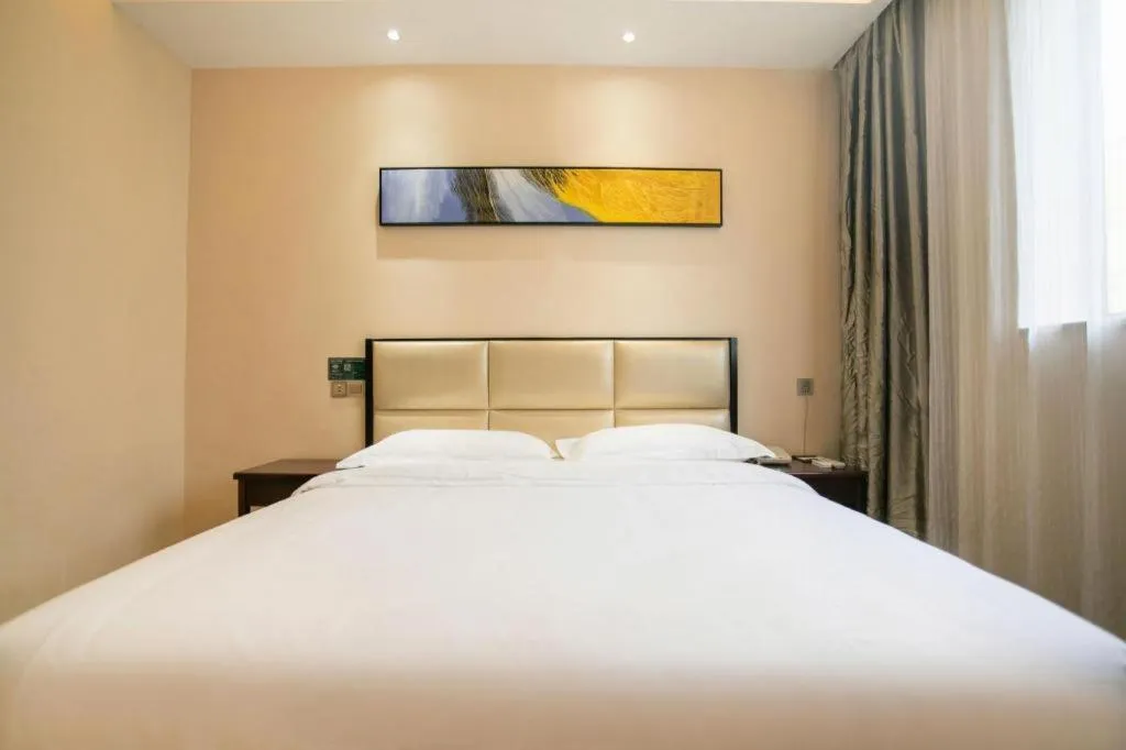 Bed in GreenTree Inn Guangzhou Panyu Bus Station Business Hotel