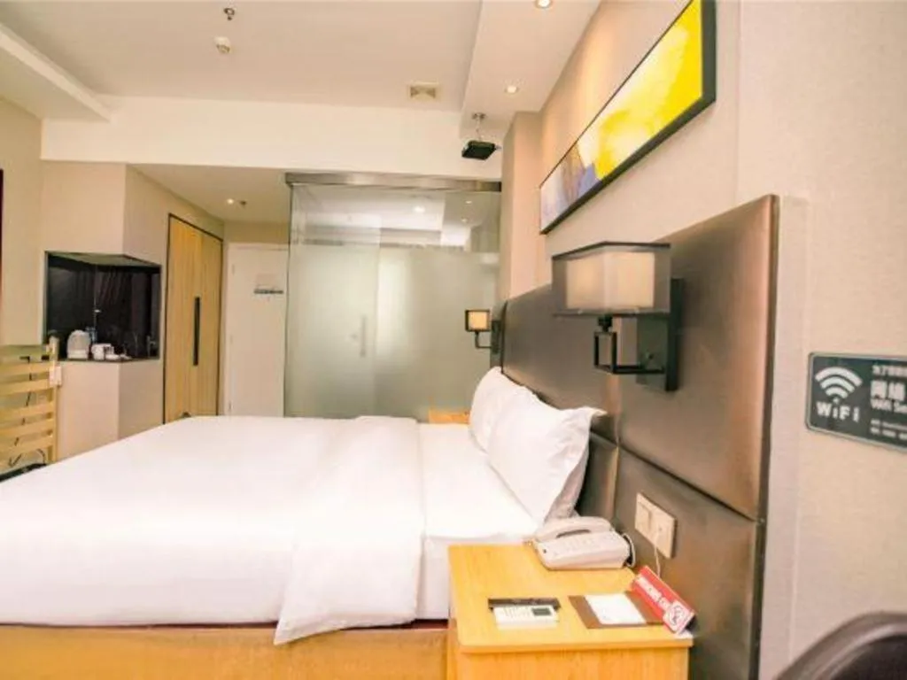 Bed in GreenTree Inn Guangzhou Panyu Bus Station Business Hotel