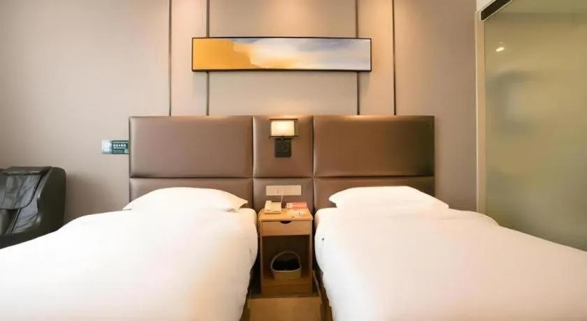 Bed in GreenTree Inn Guangzhou Panyu Bus Station Business Hotel