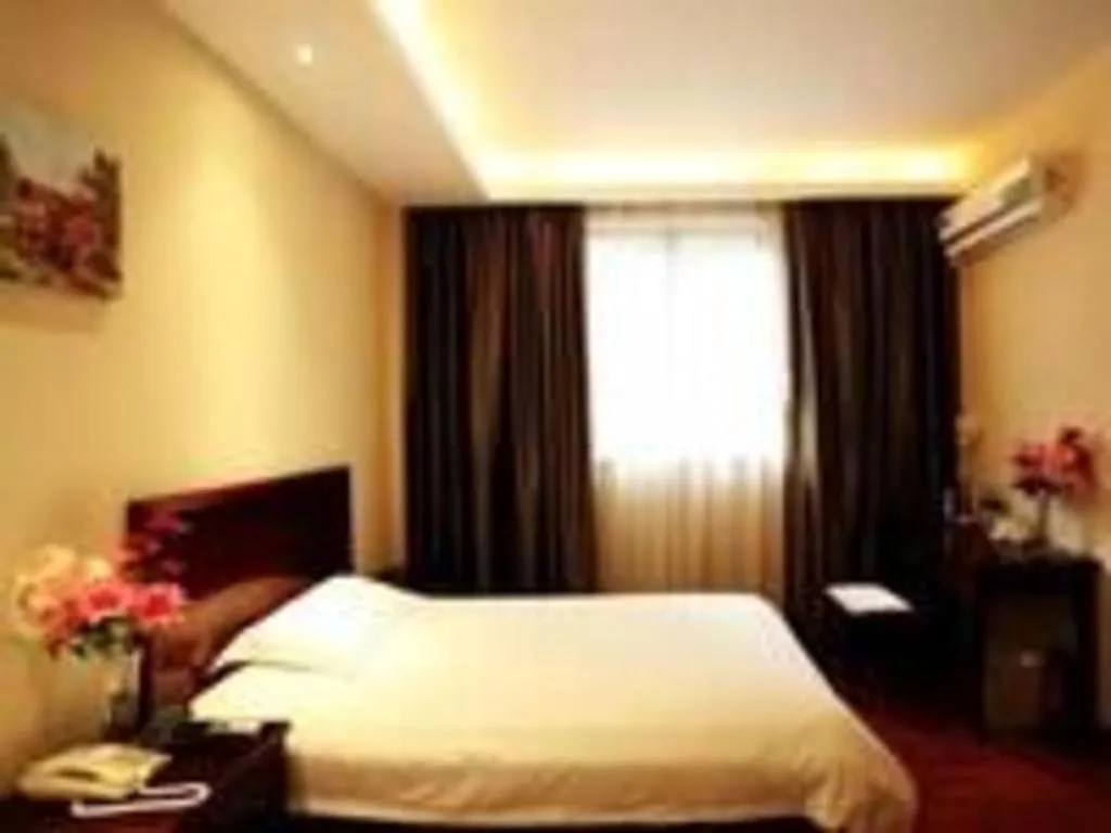 Bed in GreenTree Inn Guangzhou Panyu Bus Station Business Hotel