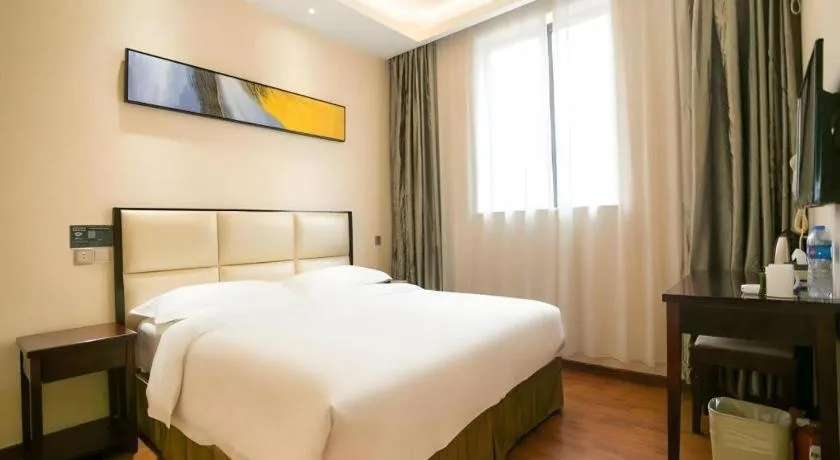 Bed in GreenTree Inn Guangzhou Panyu Bus Station Business Hotel