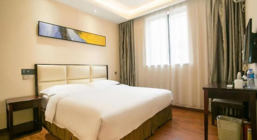 Bed in GreenTree Inn Guangzhou Panyu Bus Station Business Hotel