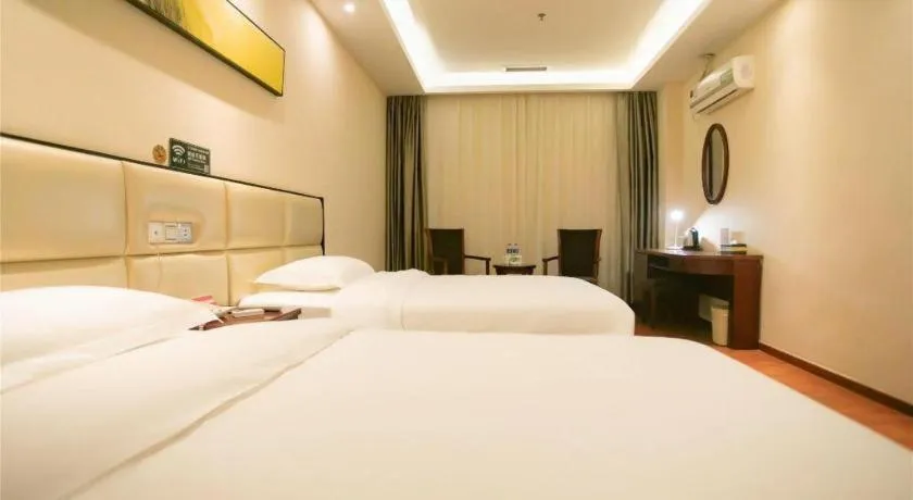 Bed in GreenTree Inn Guangzhou Panyu Bus Station Business Hotel
