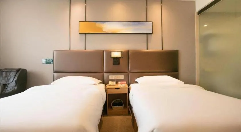 Bed in GreenTree Inn Guangzhou Panyu Bus Station Business Hotel
