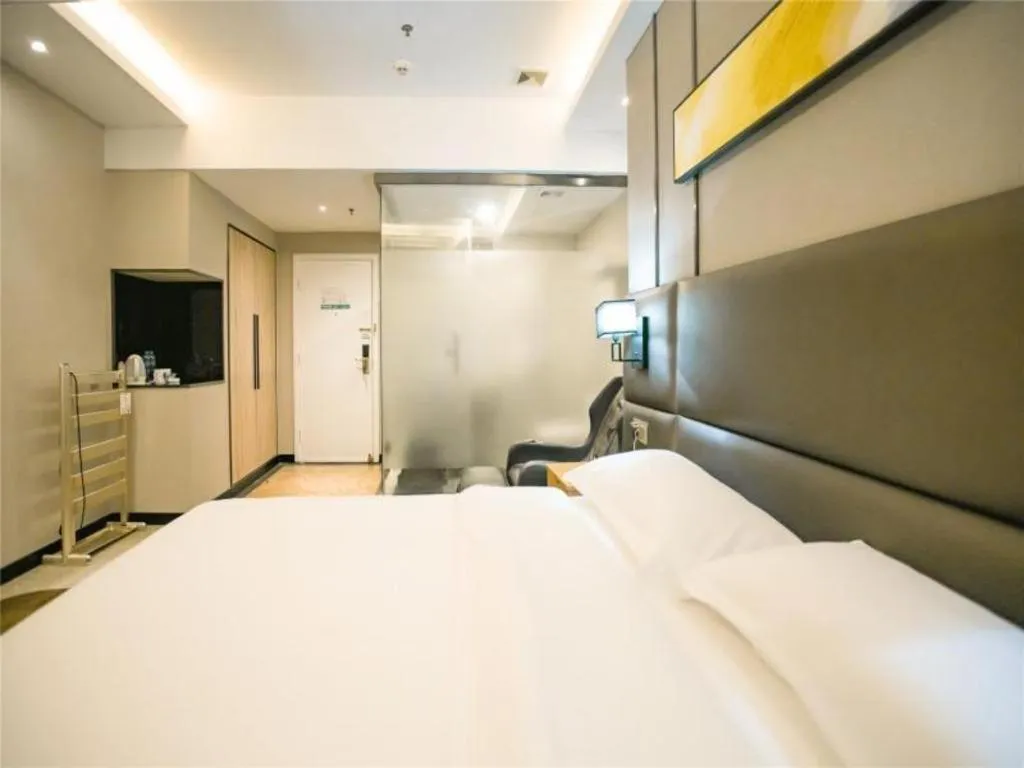 Bed in GreenTree Inn Guangzhou Panyu Bus Station Business Hotel