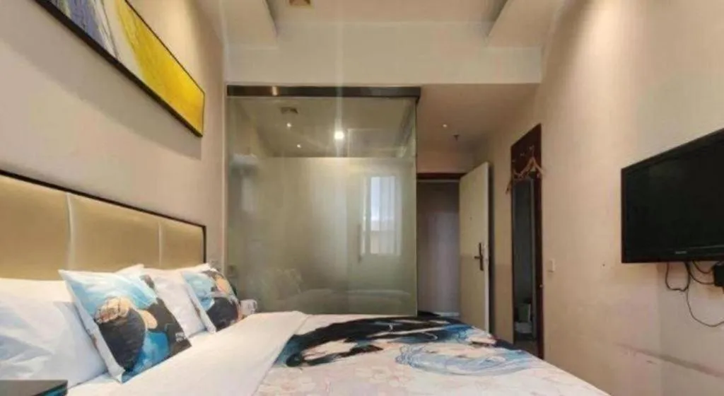 Bed in GreenTree Inn Guangzhou Panyu Bus Station Business Hotel