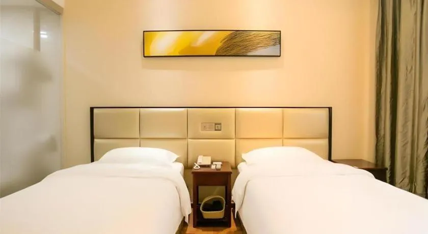 Bed in GreenTree Inn Guangzhou Panyu Bus Station Business Hotel