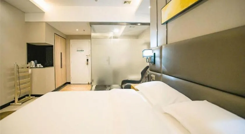 Bed in GreenTree Inn Guangzhou Panyu Bus Station Business Hotel