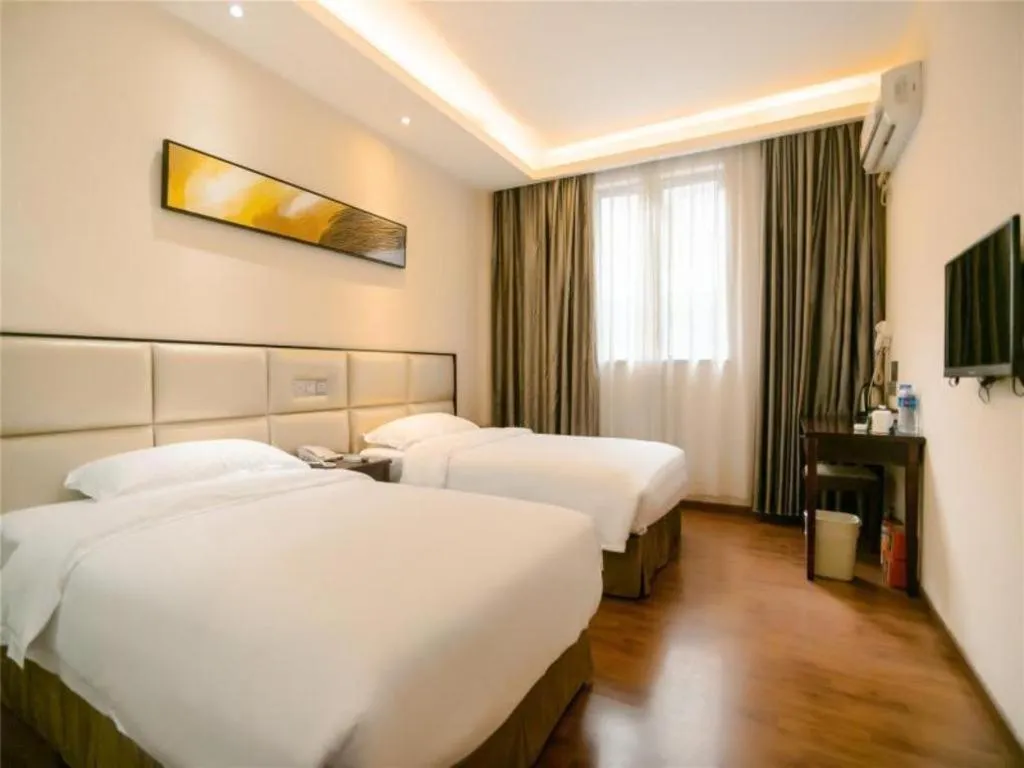 Bed in GreenTree Inn Guangzhou Panyu Bus Station Business Hotel