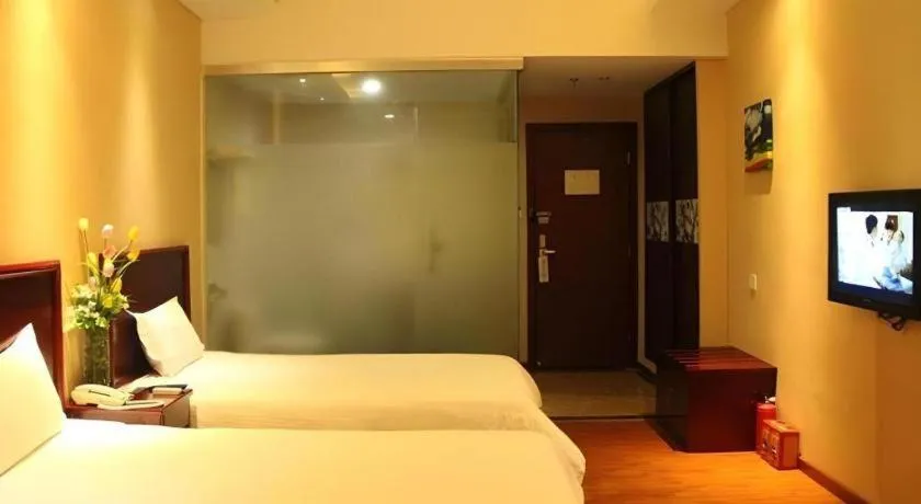 Bed in GreenTree Inn Guangzhou Panyu Bus Station Business Hotel
