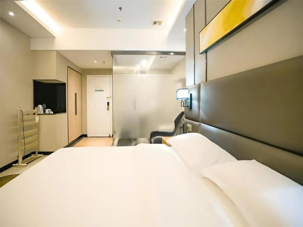 Bed in GreenTree Inn Guangzhou Panyu Bus Station Business Hotel