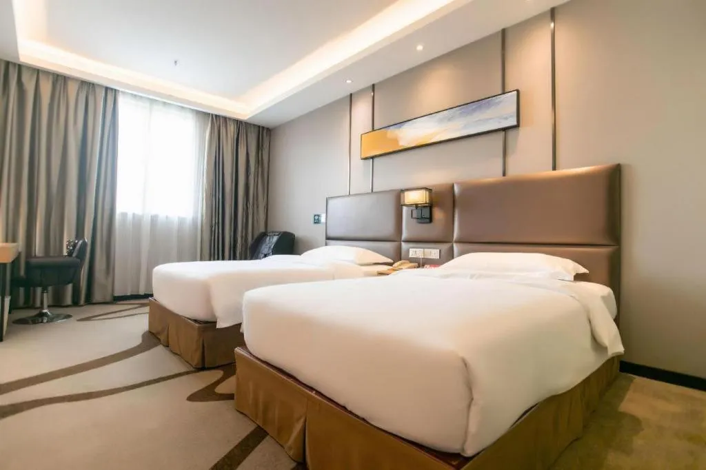 Bed in GreenTree Inn Guangzhou Panyu Bus Station Business Hotel