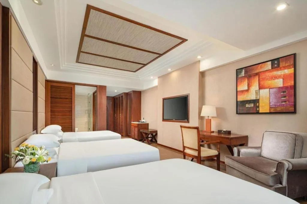 Bed in Grand Metro Park Bay Hotel