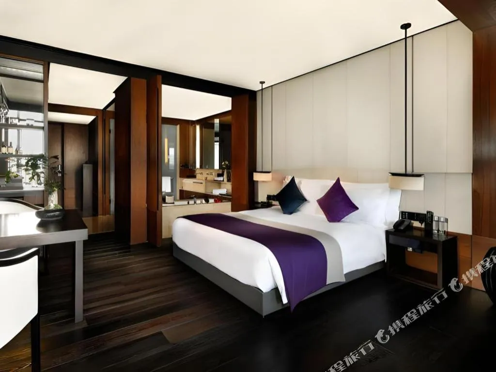 Bed in OCT Bay Breeze Hotel