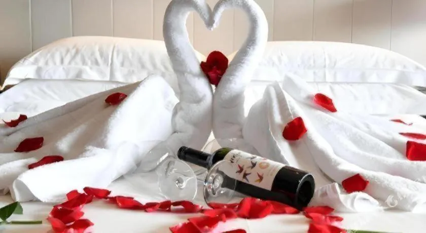 Bed in OCT Bay Breeze Hotel