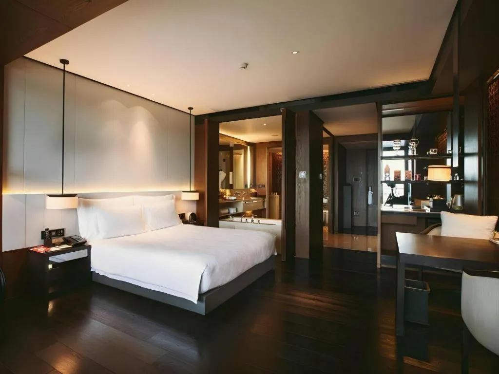 Bed in OCT Bay Breeze Hotel