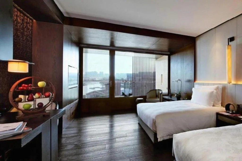 Bed in OCT Bay Breeze Hotel