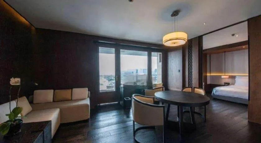 Bed in OCT Bay Breeze Hotel