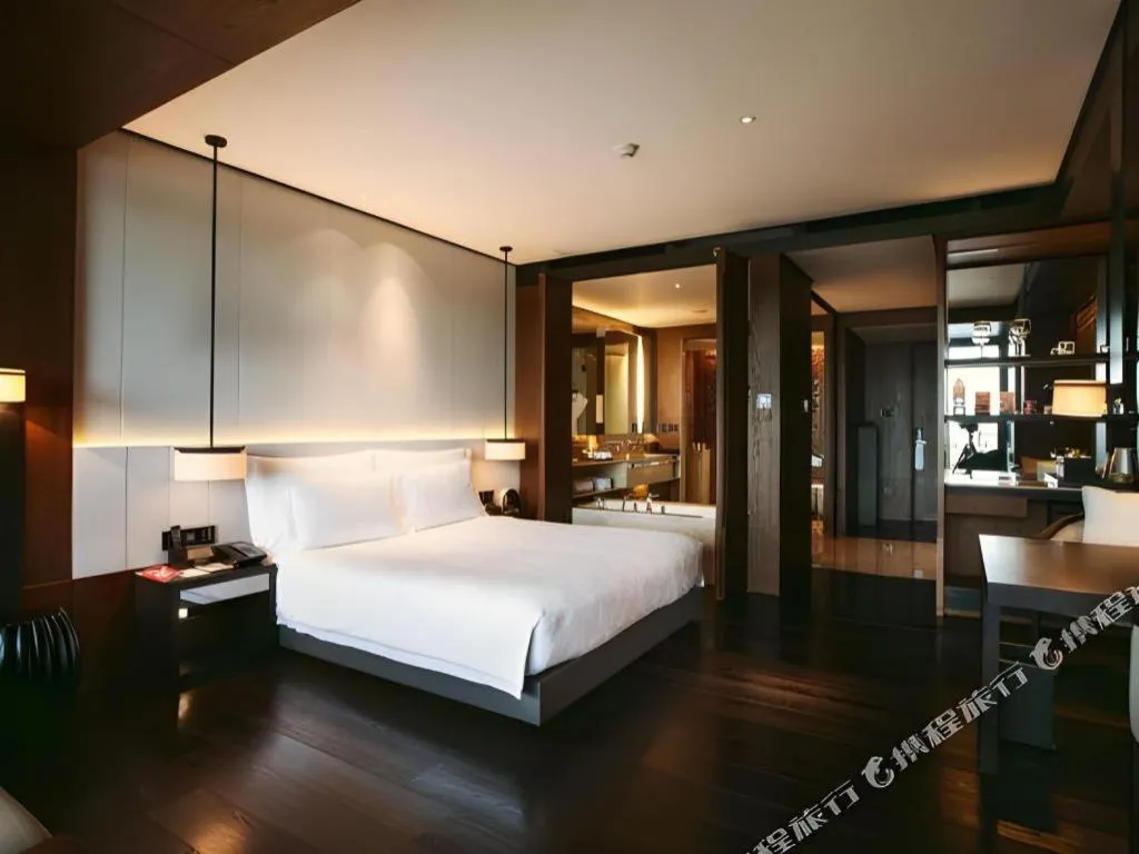 Bed in OCT Bay Breeze Hotel