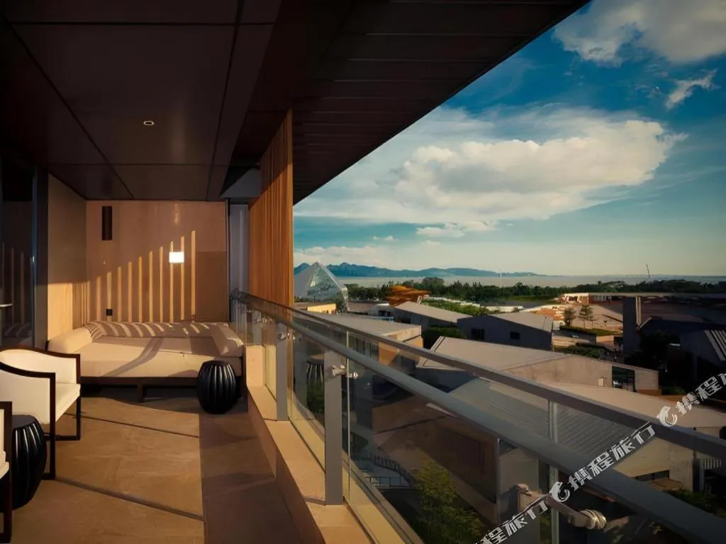 Bed in OCT Bay Breeze Hotel