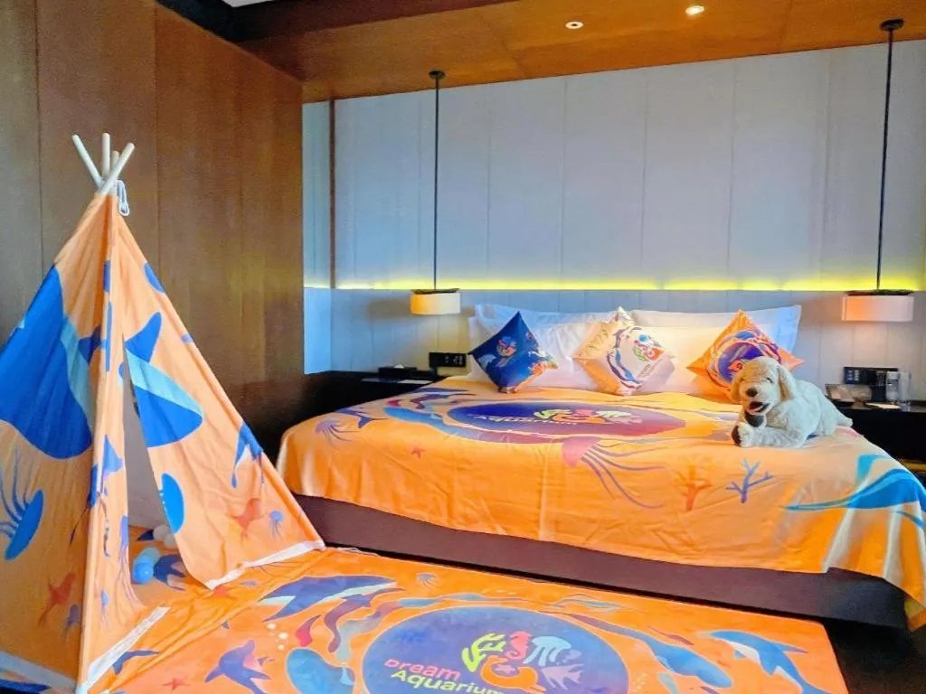 Bed in OCT Bay Breeze Hotel