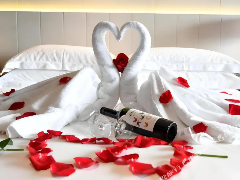 Bed in OCT Bay Breeze Hotel