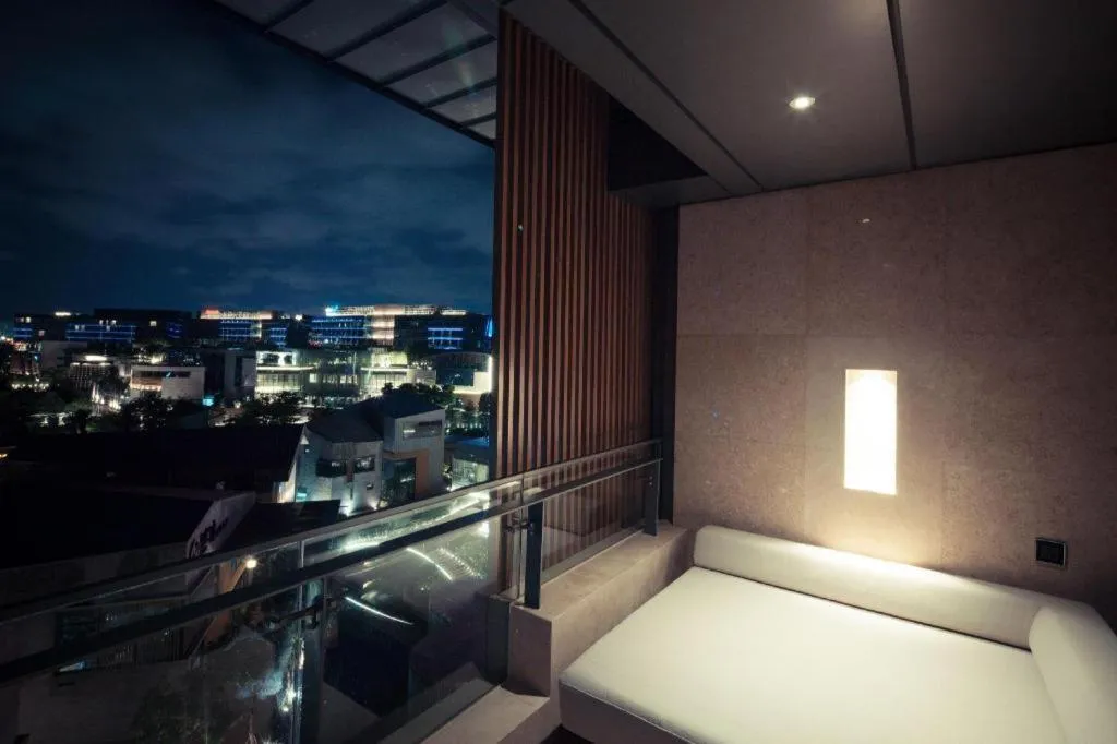 Bed in OCT Bay Breeze Hotel