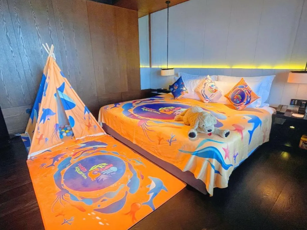 Bed in OCT Bay Breeze Hotel