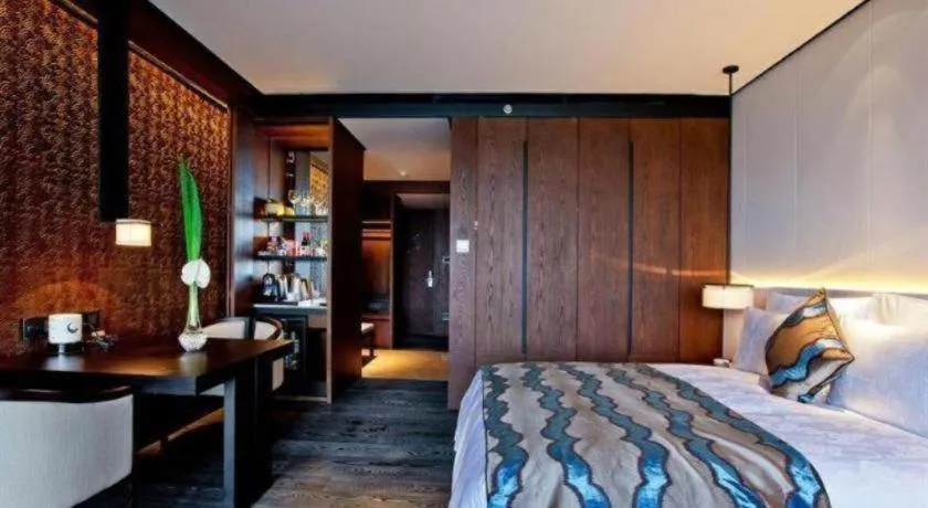 Bed in OCT Bay Breeze Hotel